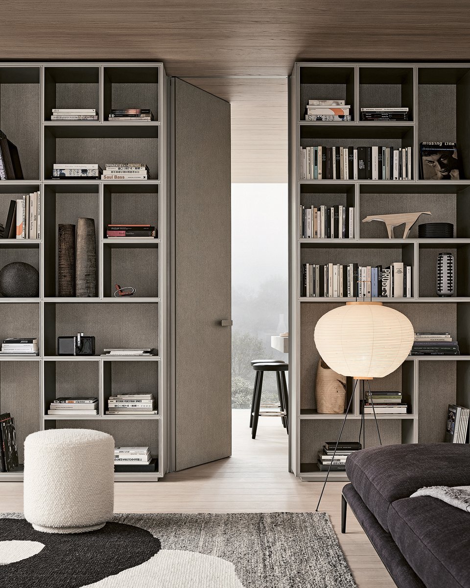 soluarquitect's tweet photo. La #puertabatiente Moon y la #libreriadediseño Opus con paneles en #Litech grigio rigato conviven a la perfección, generando interiores marcadamente arquitectónicos. Litech es un material cerámico obtenido de minerales puros fundidos a alta temperatura,  exclusivo de #Rimadesio. https://t.co/mSbRLaag3s