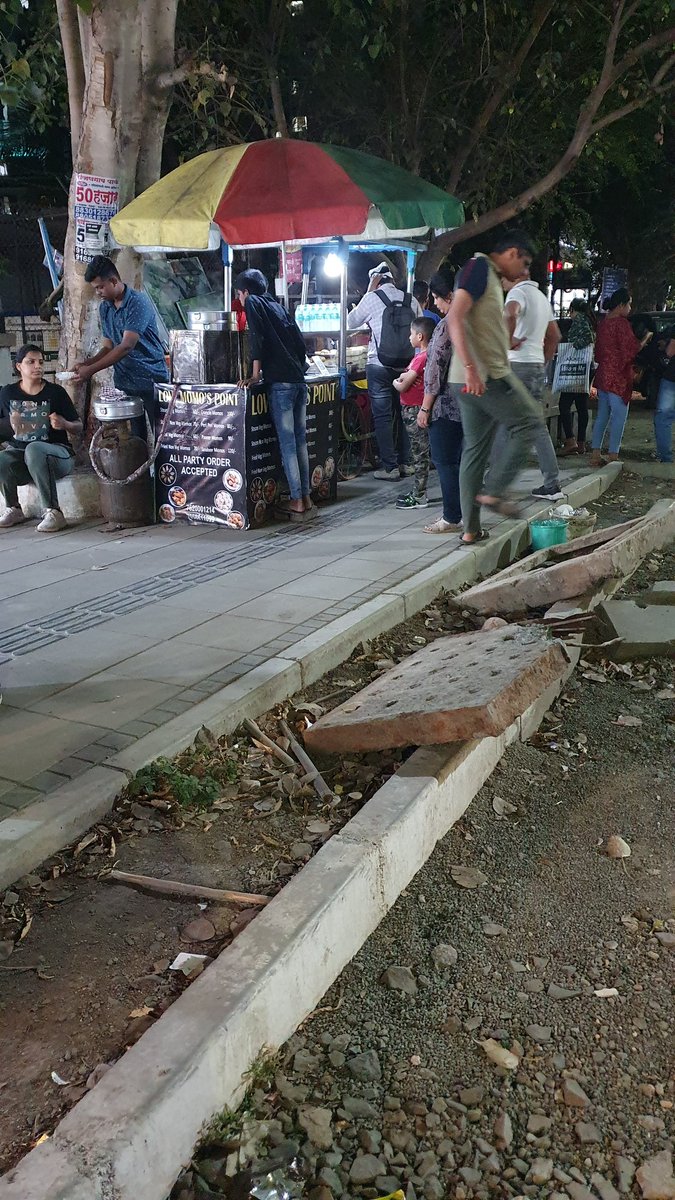 nsw_79's tweet photo. @PMCPune @SmartPune @CMOMaharashtra The newly constructed footpath not available to walk occupied by vendors. No action against complaints rasied. vighnaharta chowk Pashan sus road. #vighnahartaChowk #pashansusroad https://t.co/eDeSTaDEio
