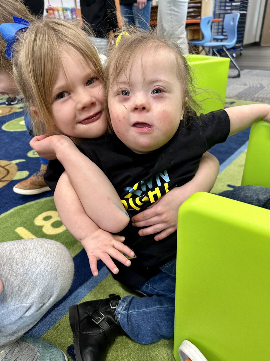 Big shoutout to our guest reader Leah Boldt from Down Syndrome Alliance of the Midlands today who read our class a special story and brought socks&amp; wristbands! And an extra special visitor, Breckyn Mergens 💗🧦✨ #downsyndromeawareness #3.21 <a href="/DCWestFalcons/">DCWest Falcons</a>