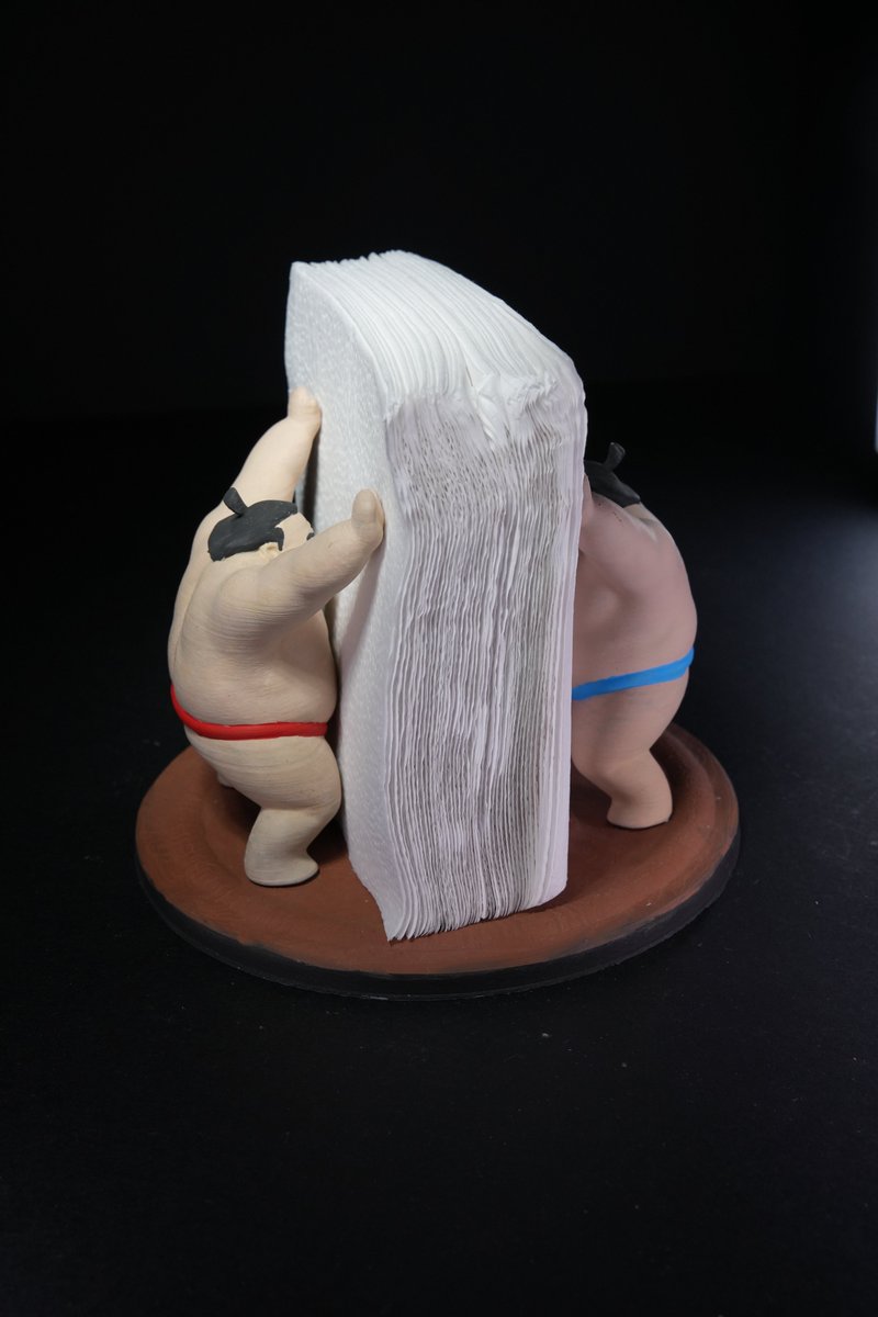 stlflix's tweet photo. Oh, your napkins won’t get much safer than this! The Sumo Napkin Holder is an STL file made to resist even storms, holding your napkins in place as these mighty fighters hold their ground!

Just kidding! It’s as light as any filament 3D print. It does look funny, though. https://t.co/CGl7zsbnLP