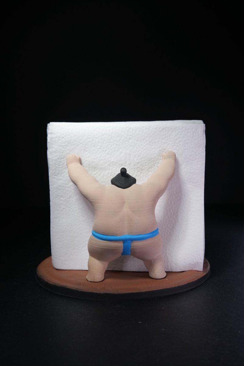stlflix's tweet photo. Oh, your napkins won’t get much safer than this! The Sumo Napkin Holder is an STL file made to resist even storms, holding your napkins in place as these mighty fighters hold their ground!

Just kidding! It’s as light as any filament 3D print. It does look funny, though. https://t.co/CGl7zsbnLP