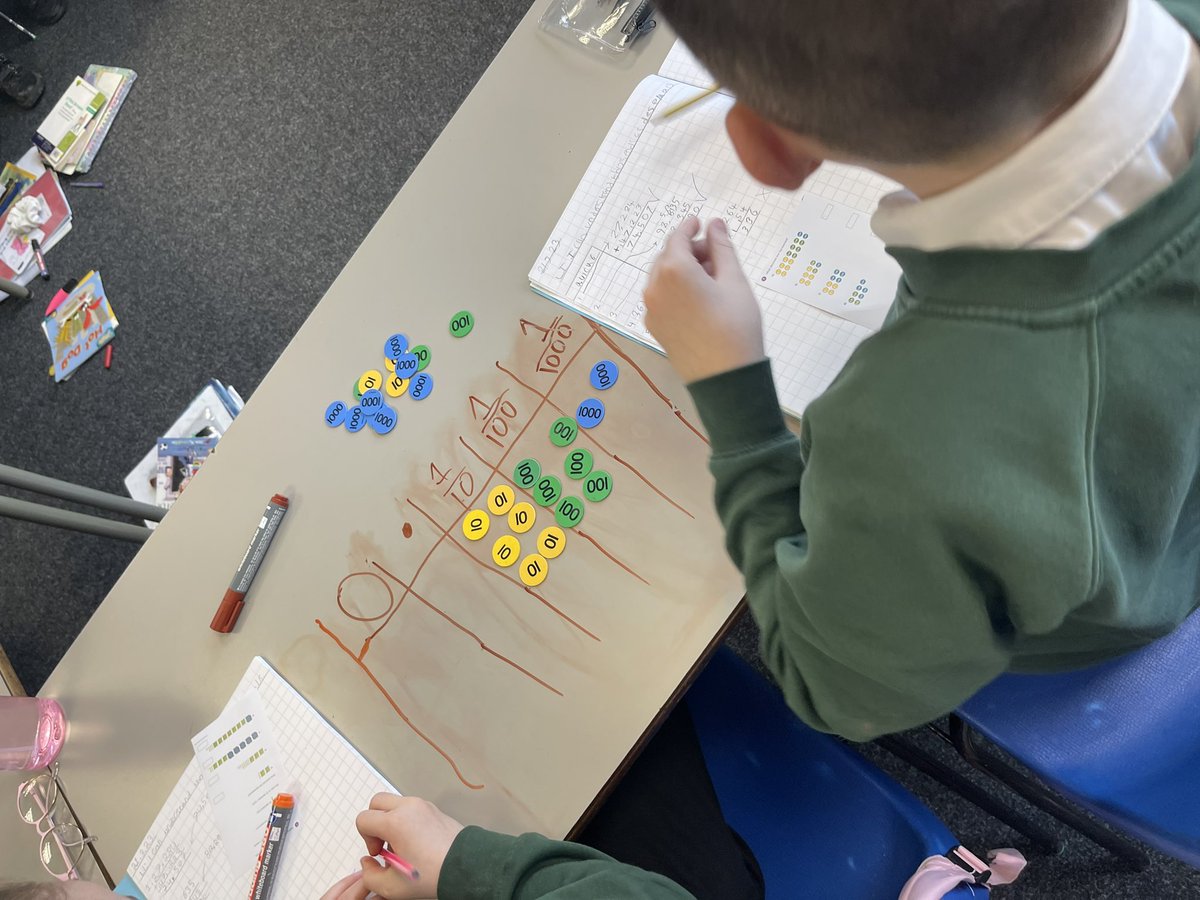 Year5CCA's tweet photo. Using place value counters in maths today to help year 5 understand thousandths as decimals 😊 https://t.co/R7yZMZwIUy