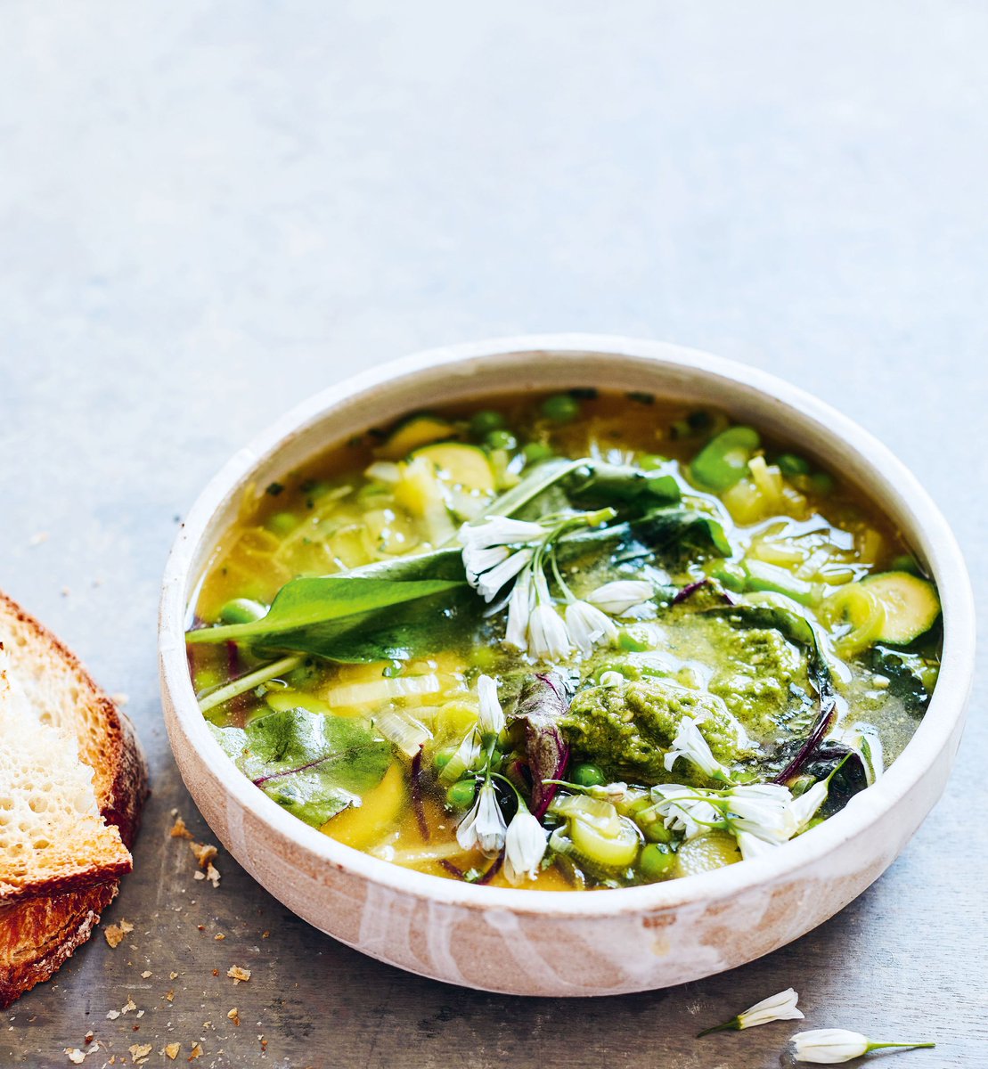 It is a challenge to get the flavour of wild garlic into a soup like this as the flavour does disappear with heat – the solution is to stir in a delicious homemade pesto just before serving. bit.ly/37S2E7G