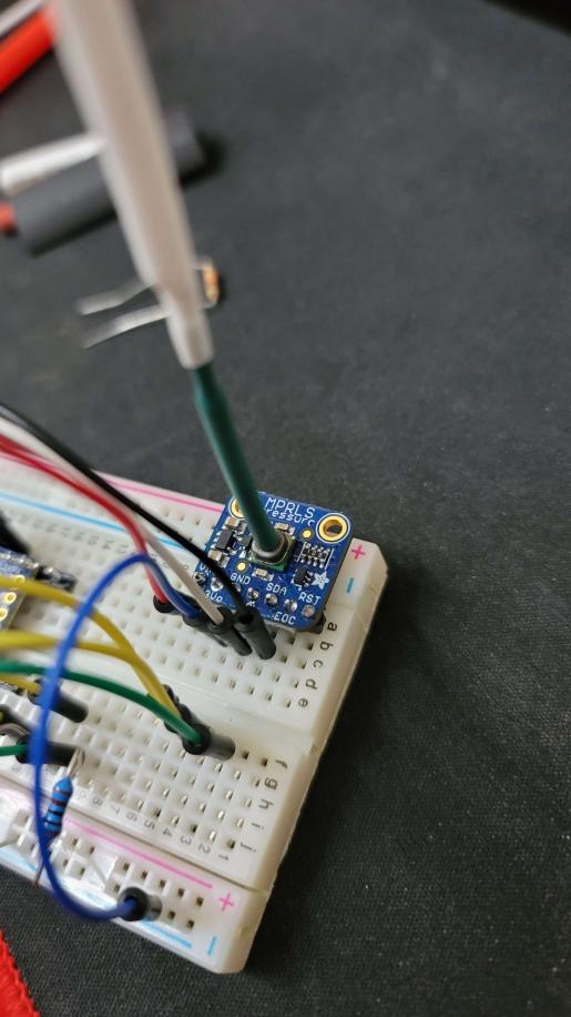 DommDynamite's tweet photo. I really wanted to get this PSI sensor to work for my trombone champ controller project. (as a blow switch) but I've been having trouble getting much of a move on the PSI using my mouth. 🤣 I think I may have to fall back on a mouth button instead. Kiss that mouthpiece 💋 https://t.co/57NgJ6ByHC