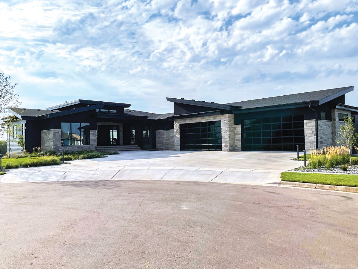 We're excited to highlight Pro Garage Doors, based in Sioux Falls, SD, as our featured dealer for the month of March! This month's ultra-modern installation features stunning FullView doors in Black.  #MidlandBuilt #GarageDoors #CurbAppeal