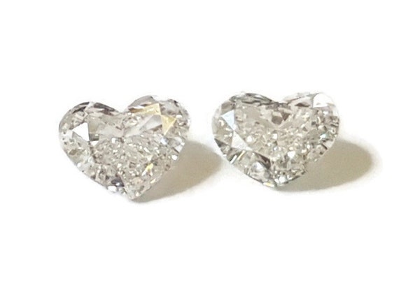 lustigbrothers's tweet image. heart shaped diamond pair, set in simple silver etsy.me/3FHEk6y #diamondstuds #heartdiamond #customdiamondring #heartstuds @etsymktgtool