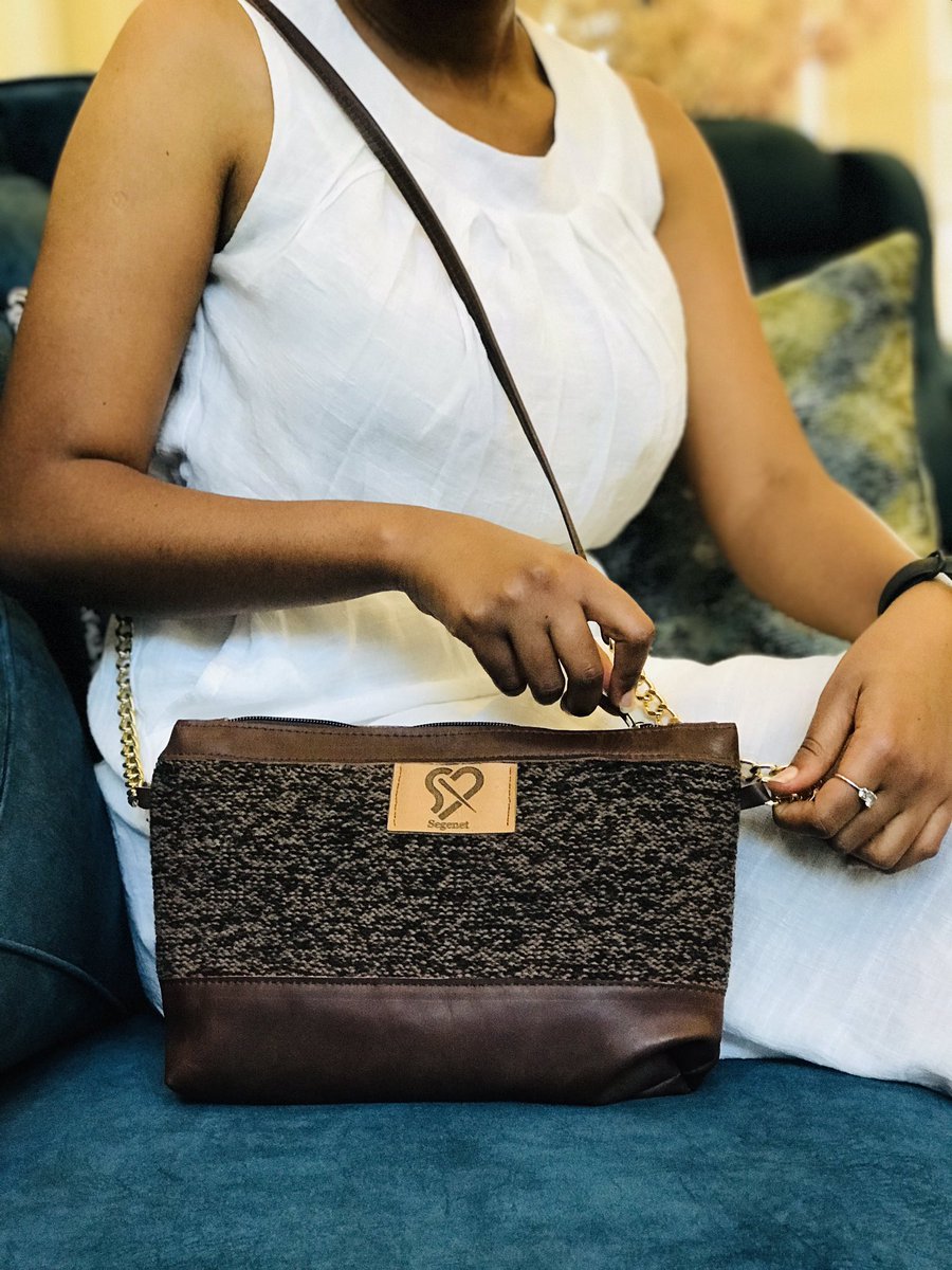 Introducing my brand new bag! Made with the finest locally-sourced leather and hand-knit accents, it's the perfect combination of style and function. Get yours today and support local artisans in Ethiopia! 
#EthiopianCraftsmanship #FashionDesign #HandmadeBag