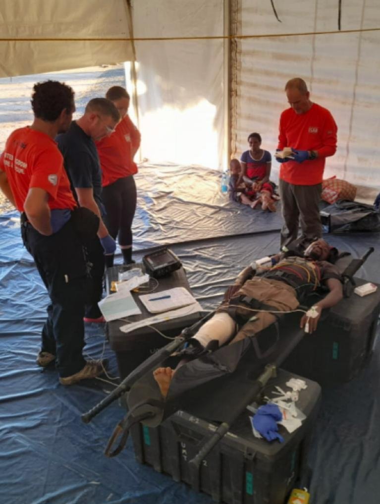 Today, #UKISAR and local aid teams helped evacuate and ensure the safety of 123 individuals, contributing to a total of 290 rescued. 

Our #UKISAR medical team provided treatment to male who sustained injuries due to the floods #rescue #Malawi 

 🧡