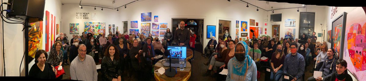 alannealottawa's tweet photo. Big thanks everyone who was there for the @cbcallinaday book club who packed @OrangeArtGalery  last night with @reid_iain about his book We Spread... tough to pack everyone into one panorama shot, not to mention everyone who joined in by Zoom! Featuring Part 1 on radio this aft! https://t.co/ZGZUpMNpcc