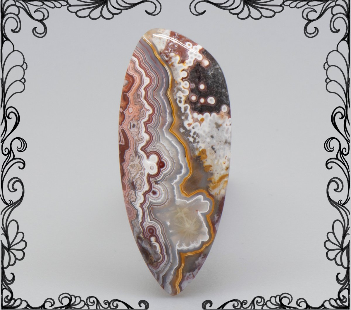 Laguna Lace Agate 
Beautiful red, white and yellow bands bubbling throughout this stone that was handcut by Nyssa in Wisconsin, USA av122
#lagunalace #cabochons #laceagate #agate #lapidaryarts #silicadreams