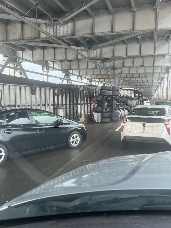 KTVU's tweet photo. .@CHPSanFrancisco says a big rig has overturned just east of 1st Street on-ramp on EB I-80 (Bay Bridge). Trucks asked to exit I-80 at 4th St. Do not attempt to cross Bay Bride at this time. #breaking https://t.co/zTvsMd4K03