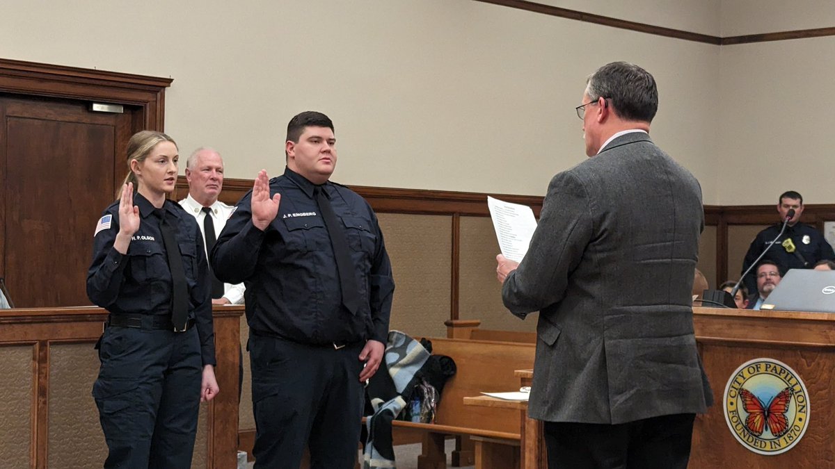 CityofPapillion's tweet photo. Congratulations to our two newest firefighters — Hailey Olson and James Engberg! They were sworn into @PapillionFire by @dpblack during tonight’s Papillion City Council meeting. https://t.co/xoXC2ORsgw