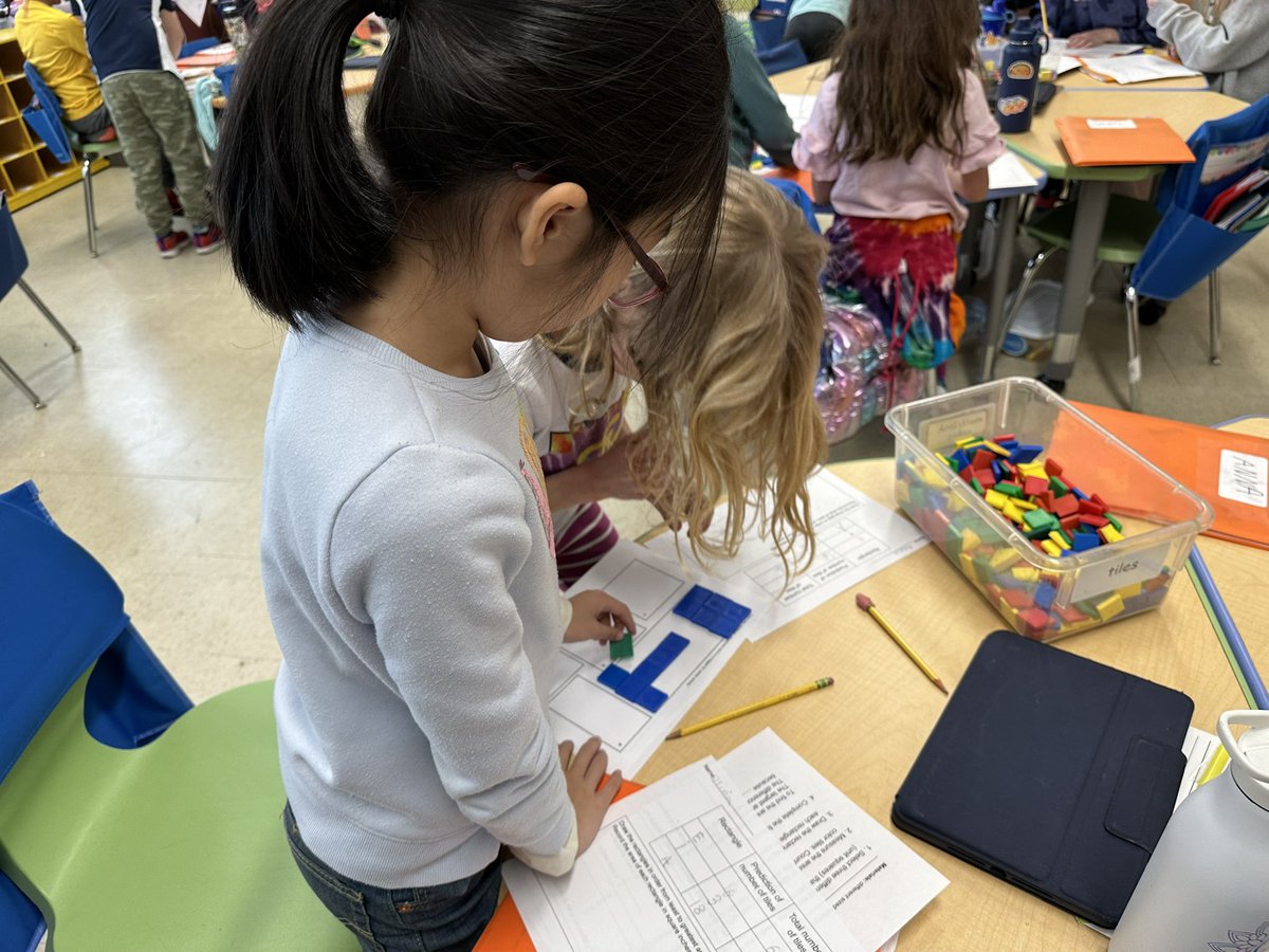 Third grade mathematicians worked together to find the area of different rectangles using square inch tiles. #WeAreChappaqua #RBPride