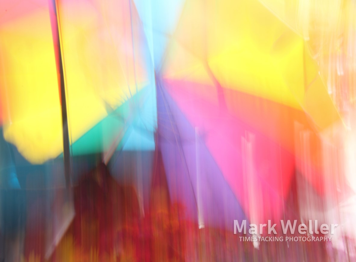 TimeStacking1's tweet photo. "Mere color, unspoiled by meaning, and unallied with definite form, can speak to the soul in a thousand different ways." -  Oscar Wilde. Farmers Market Umbrella, shot at the Capitol Square in #Madison WI. #TimeStacking #PhotograpicArt See my gallery at https://t.co/N84F3Vl9a6 https://t.co/T3agpWiUB7