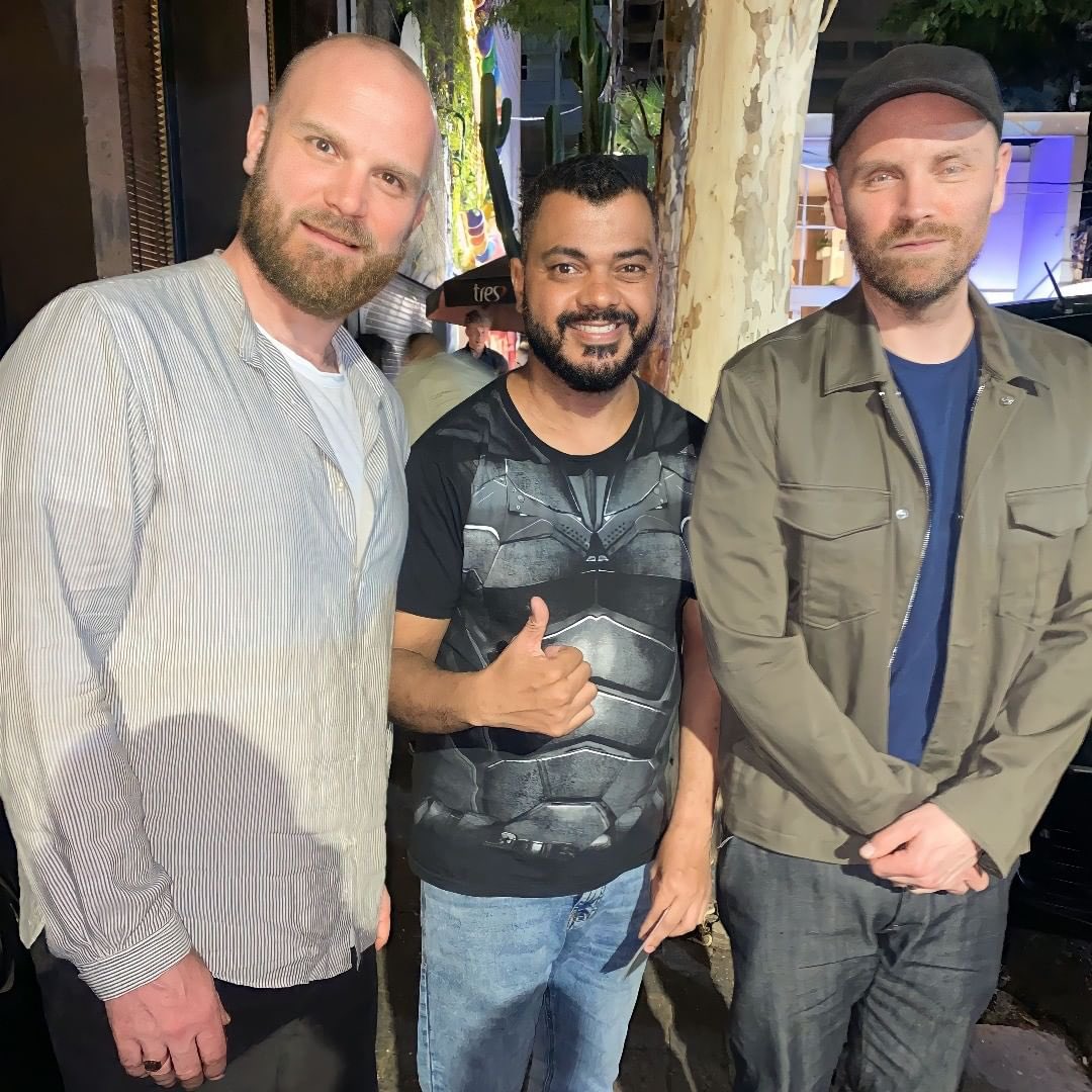 Coldplaying on X: Will Champion and Jonny Buckland with a fan in Curitiba  🇧🇷