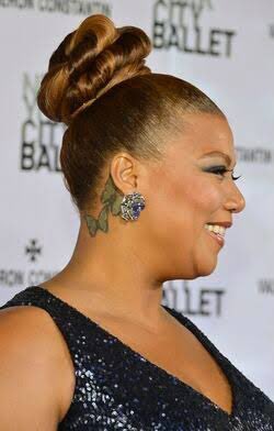 Actress Queen Latifah tattoo and earring detail arrives at the Photo  dactualité  Getty Images