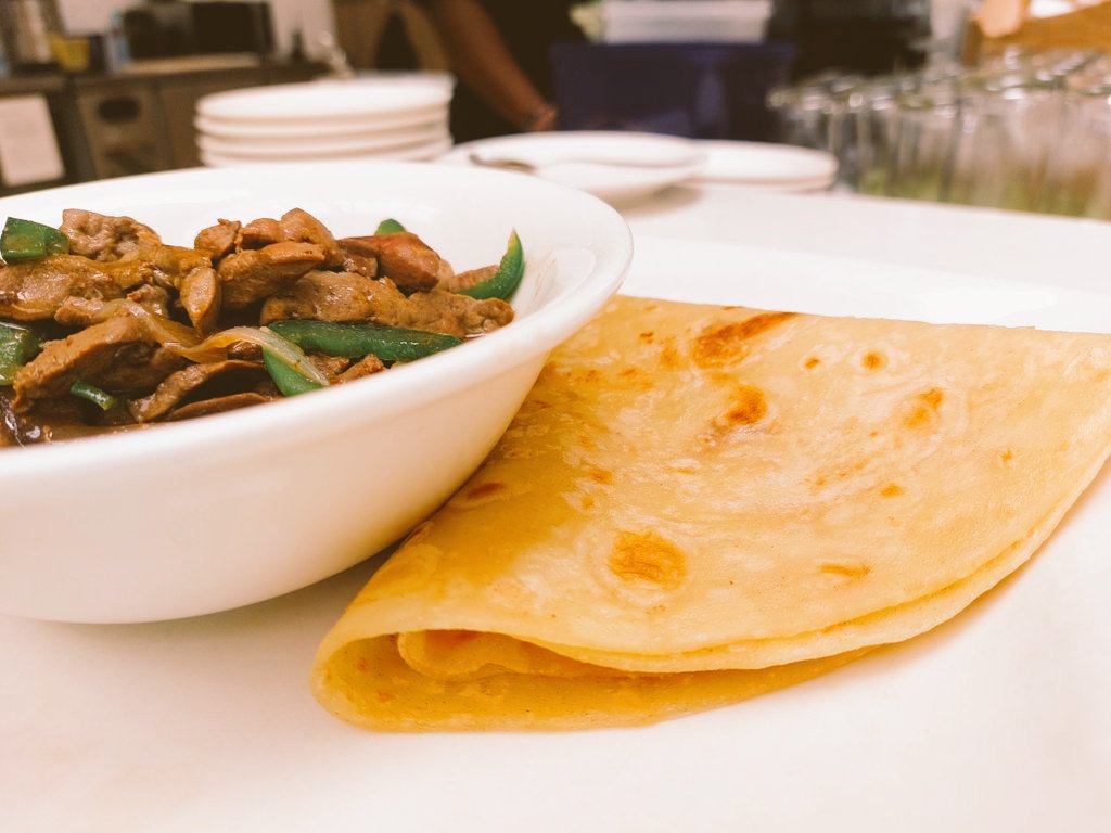 HouseofMandi's tweet photo. Enjoy the delicious flavors of a traditional Somali breakfast with fried goat liver, chapati and camel tea! #SomaliBreakfast https://t.co/lM3AV5Z2FM