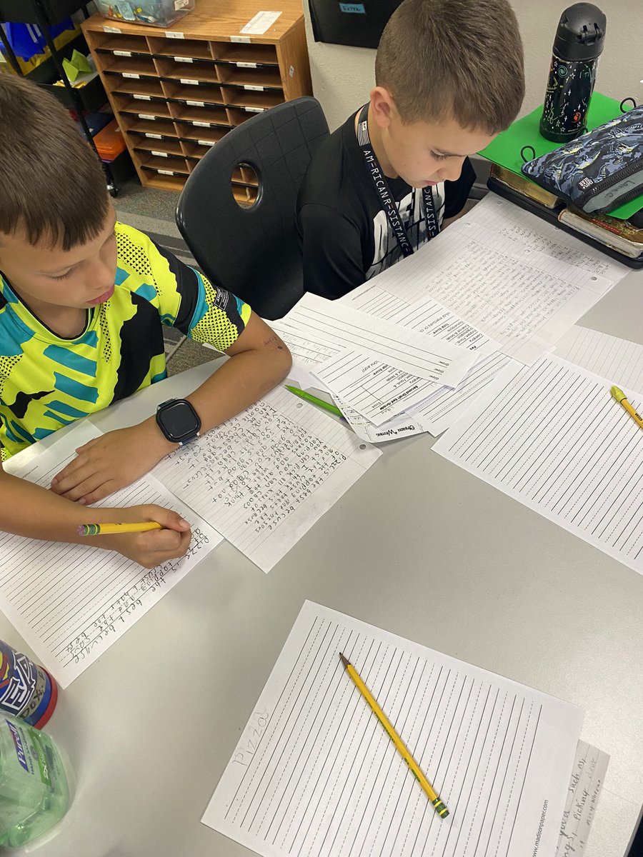 Ss writing and peer editing their argumentative essays.