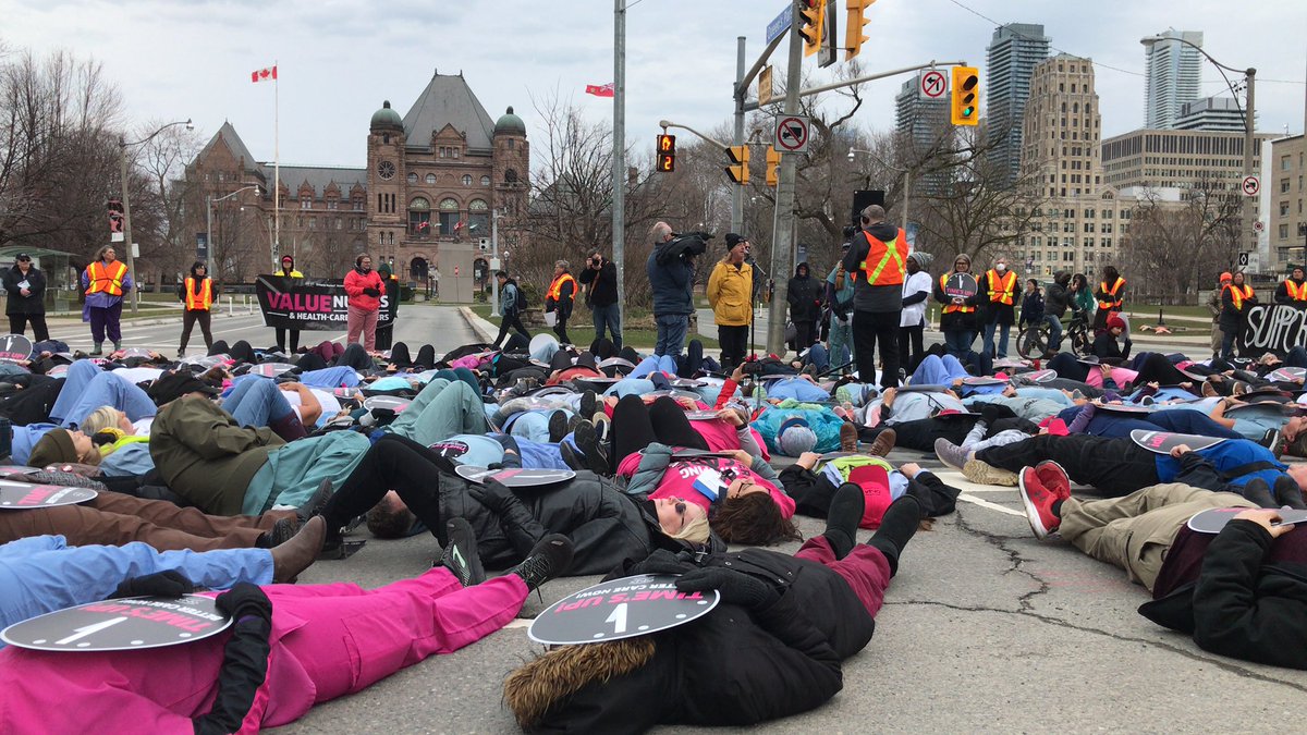 Ontario Nurses, health-care professionals, Teachers & labour allies lying down in the street staging a die in. Wake up @fordnation 
🛑 Stop privatization 

🛑 Stop the cuts 

✅ Fund the public sector #EnoughIsEnough #TimesUp
#SupportNurses @ontarionurses  #OnPoli #OnEd #ETT