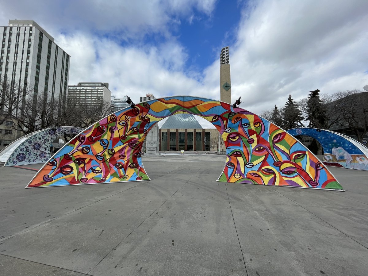 CityofEdmonton's tweet photo. Three giant walkthrough gateways are set up in front of City Hall. Check out the latest artwork from #theworksfest! #yeg #yegarts #yegartist #VibrantYegDT https://t.co/YFdPCmTFs3