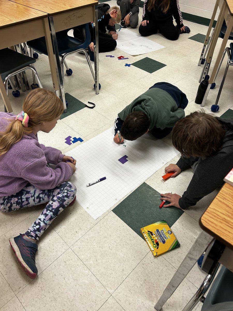 Hopkins_UTES's tweet image. Students are using pentominoes to calculate the translations (slides) from the first location to the second. #math #spatialsense
