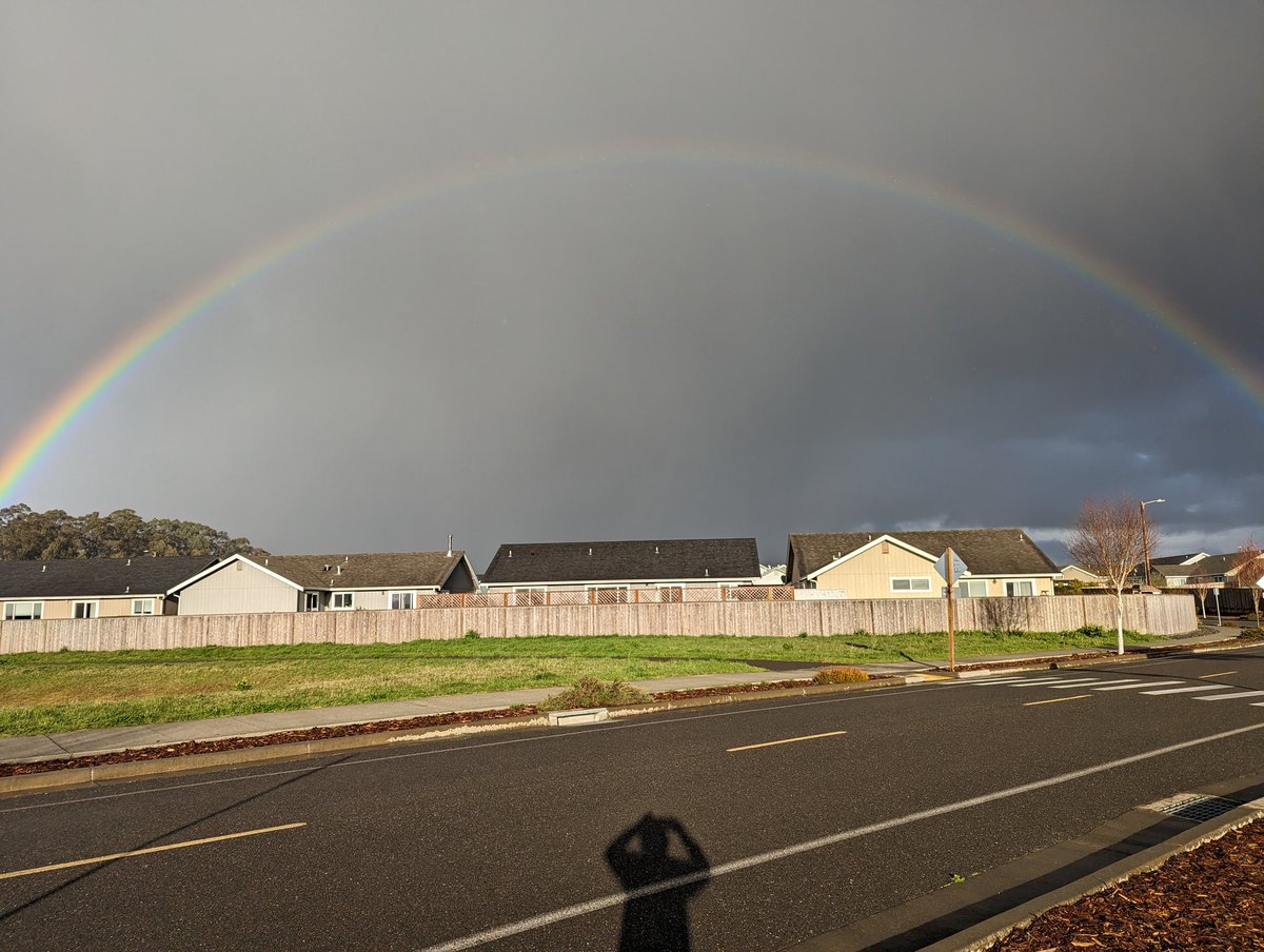 K_McBass's tweet photo. This picture I took yesterday. Pretty cool to see a complete rainbow. 

#rainbow #Humboldt #NorCal #yesterday #stromming #darkclouds https://t.co/c6JFznwCgo