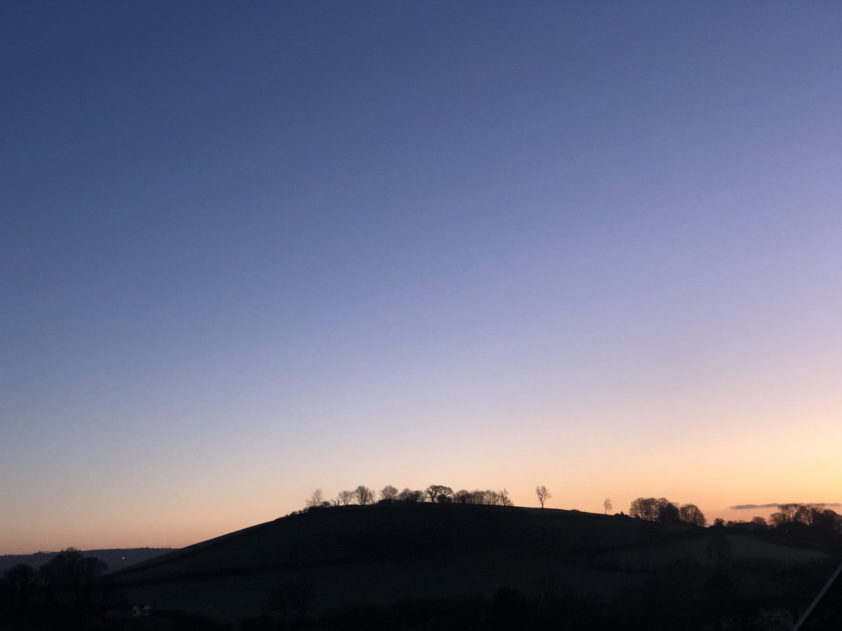 On a week that has proved I have yet to learn how to pace myself to help manage my chronic fatigue, here is Caerfyrddin in the light of the rising sun, two sets of roiling cloud, and daybreak for #SmallBeautiesHour