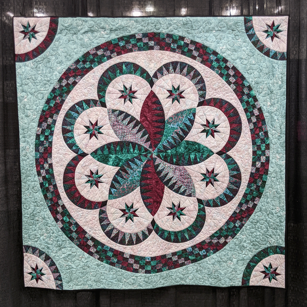 WIQuiltShow's tweet photo. "Spring Fever," created by Judy Anderson of Wisconsin Rapids, Wisconsin and quilted by Georgia Knuteson, entered in the 2022 Quilt Show, Wall Quilts - Machine Quilted - Pieced category. Pattern/design source: "Spring Fever" by Jacqueline de Jonge #quilts #quiltinspiration https://t.co/GtZTD1JDXn