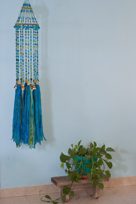 PeterRonit's tweet image. Turquoise Bohemian Wind Chime With Brass Bells etsy.me/3y1S8EQ #ceilinghanging #bellsdecor #bellwindchimes #windchimes @etsymktgtool