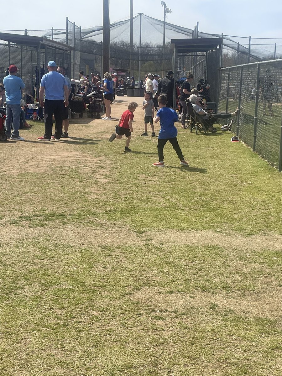 Playing ball and watching cousin play while also playing haha