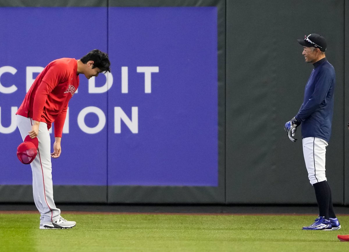 lindseywasson's tweet photo. Los Angeles Angels' Shohei #Ohtani takes off his hat and bows to former Seattle Mariners player #Ichiro Suzuki before a baseball game Monday, April 3, 2023, in Seattle. For @AP_Images https://t.co/hkQzsDd30R