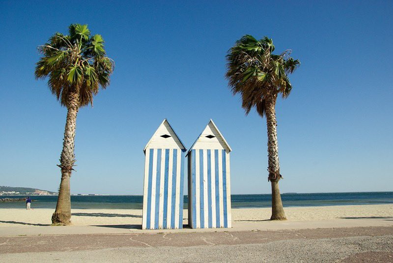 Only in France! Want to check out these his and hers change cabanas on the beach at Sète on France's Med coast? I do 🙂 #OnlyInFrance #Sète #MedCoast #BeachCabanas #HisAndHers #TravelGoals #SummerVacation #CoupleGoals #BeachLife #TravelFrance #FranceVacation #FunFinderVacations