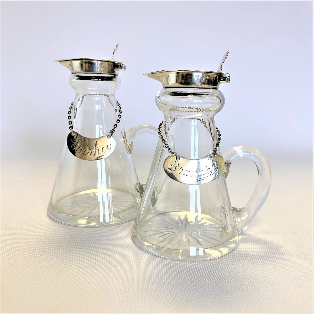 ParkLaneAntique's tweet photo. A handsome pair of Antique Silver Mounted Glass Noggins with labels. A quality gift for whiskey and brandy connoisseurs! https://t.co/Dbkl2sQ2kU
#antiquesilver #noggins #decanters #antiques https://t.co/LbHnCgHVrd