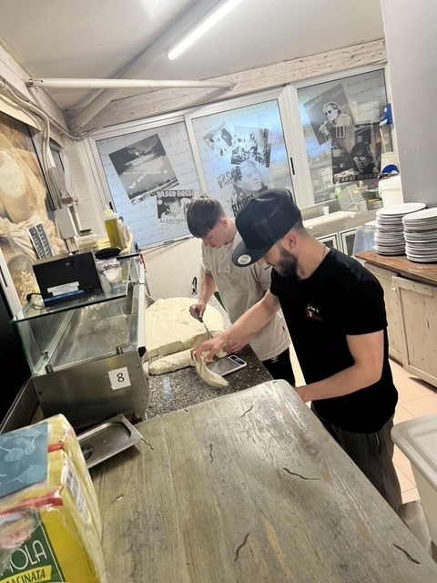 BSDCofficial's tweet photo. Catering and Hospitality students have begun their international work experience placements in Italy, with half of the group working in a bar, grill and pizza kitchen at a large venue and the other half working in a hotel restaurant. #JobReady #GlobalMindset https://t.co/sKl1opY60i