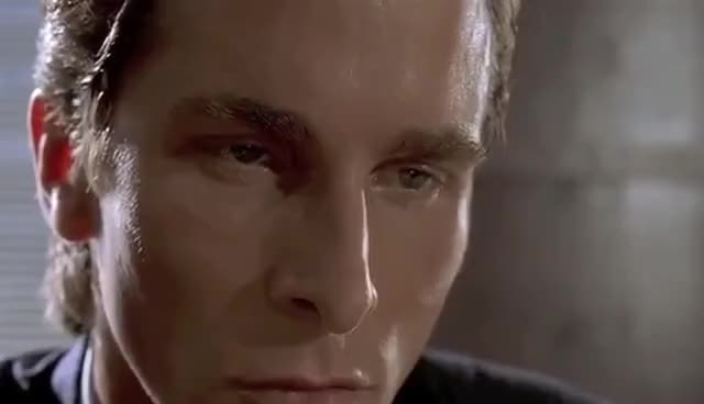 Gensler staring at the Doge as he loads up Twitter on his government-issued Thinkpad