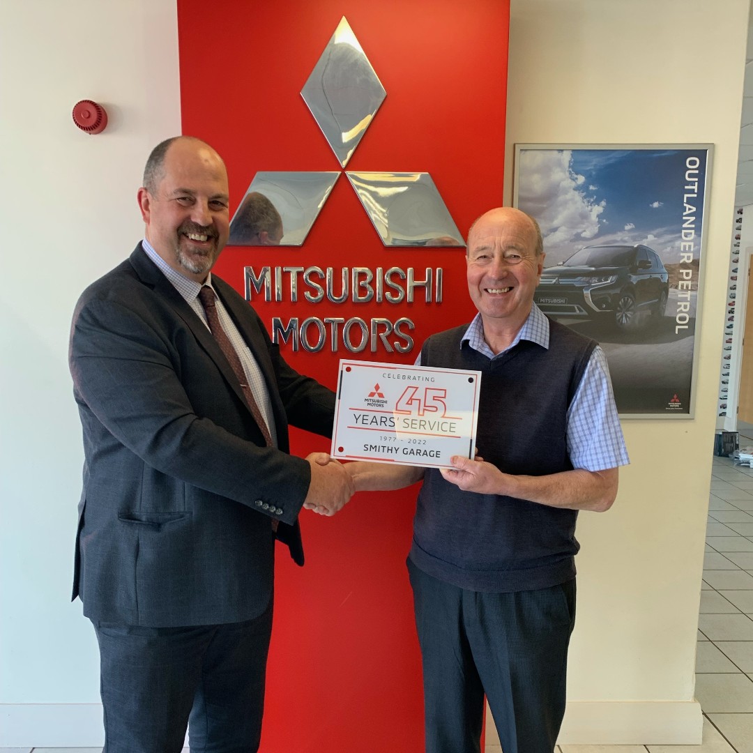 Congratulations to Smithy Garage on 45 years with the Mitsubishi family. John Lennon, our General Manager, congratulates their Dealer Principal, John Roberts, on this fantastic achievement. Well done! 👏 #Mitsubishi #MitsubishiMotors #MitsubishiMotorsUK