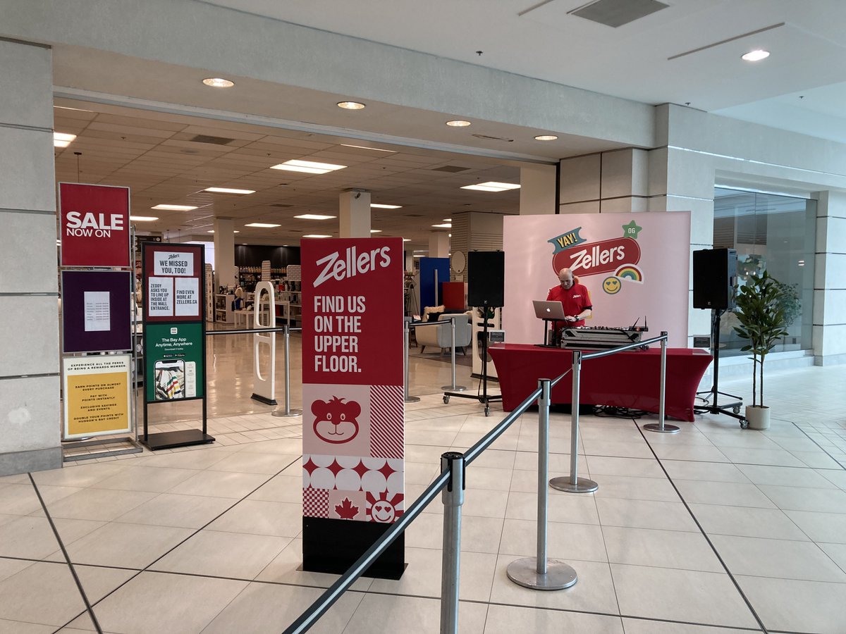 They’ve got a DJ outside Zellers.