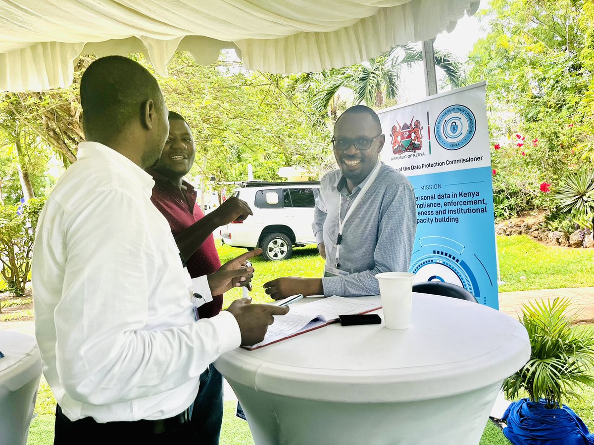 Deputy Data Commissioner Oscar Otieno <a href="/otienoscar_ke/">Oscar Otieno</a> and a team from <a href="/ODPC_KE/">OFFICE OF THE DATA PROTECTION COMMISSIONER</a> sharing a light moment on the sidelines of the #ConnectedSummit2023