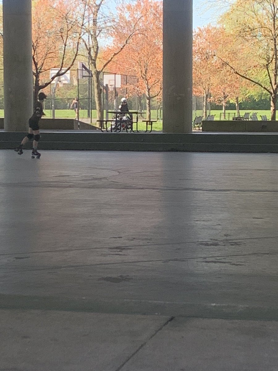 Watching a motorcycle cop practice trick riding at the skate pavilion in a Anacostia Park and he crashed into the wall on the ramp.
