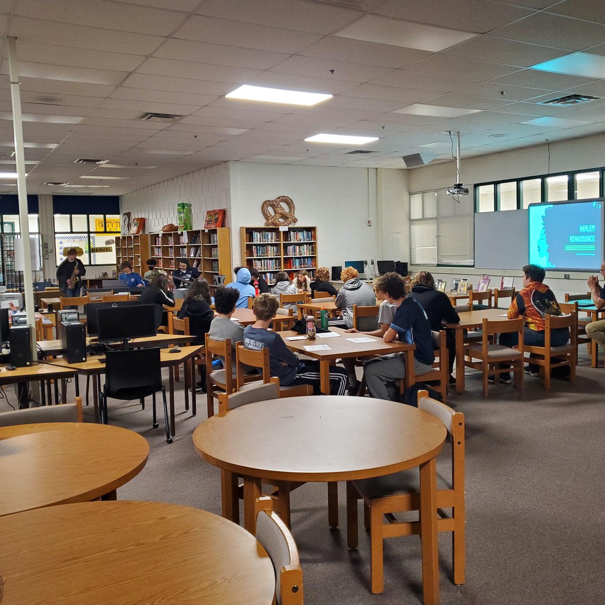 FelmetFCPS's tweet photo. Four members of our Jazz Band perform improv jazz for the African American Studies class as they study the Harlem Renaissance. They were also able to explain some of the qualities of jazz vs. blues music. https://t.co/mqpZlYrmpy