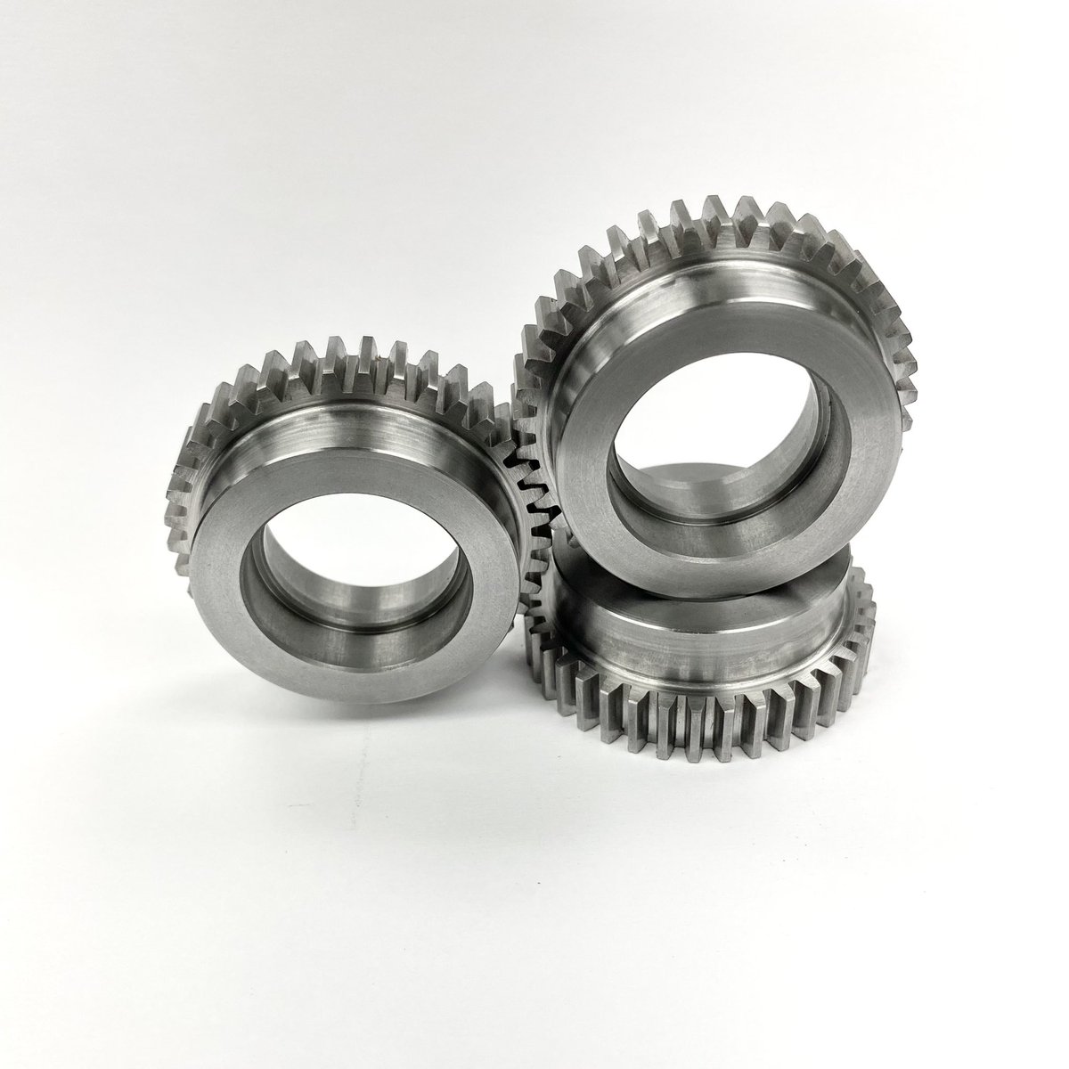 HMManufacturing's tweet photo. HM custom manufactured these 316 stainless gears for the aerospace industry. These pieces started out in our CNC lathe before moving over to our CNC gear hobber.  

To find out more, visit our website at https://t.co/jGKwxarSTW
#HMManufacturing #manufacturing #automation https://t.co/7eOMar9Kgs