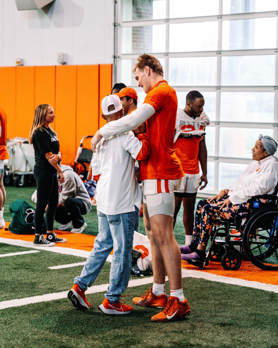 ClemsonFB's tweet photo. The #ClemsonFamily is not complete without this group 🧡

Thank you to the entire staff here at Reeves for making this a special place to work and play. https://t.co/DsdwfgcqJ8