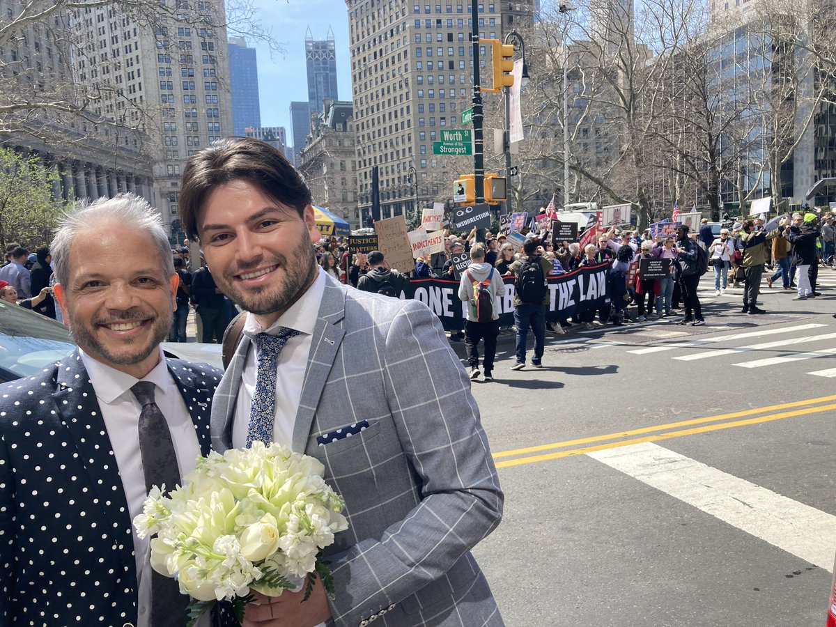 Daniel and Chris met a year ago today. That’s why, a few weeks ago, they decided to get married this afternoon.

They just left the clerk’s office — right as news broke that former President Donald Trump’s motorcade is about to arrive so he can be arrested.