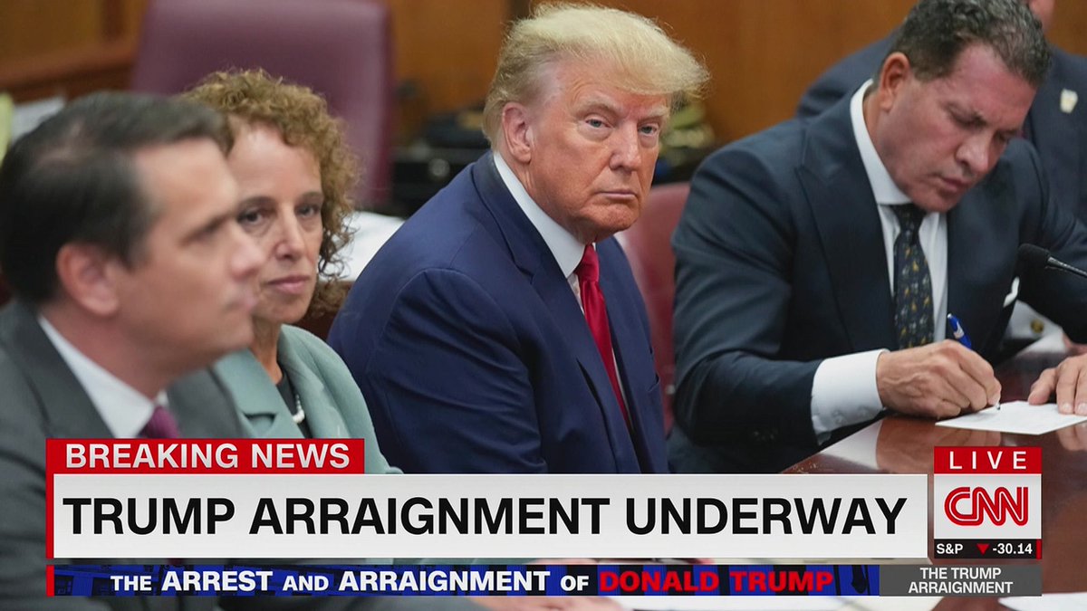 brianstelter's tweet photo. "The photograph is stark and historic," @jaketapper says. "That's a man who looks like a defendant," @Alyssafarah adds https://t.co/PikDO0FRCx