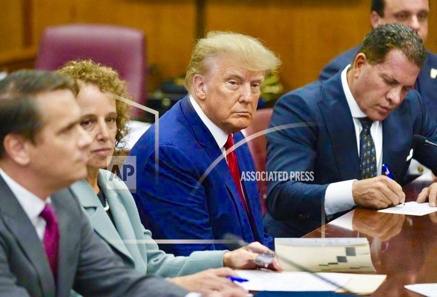 CalltoActivism's tweet photo. 🚨MAJOR BREAKING

AP has released the first and ONLY image of Donald Trump inside the Manhattan Courtroom where he is currently hearing the charges against him. https://t.co/8or6HJMMK9