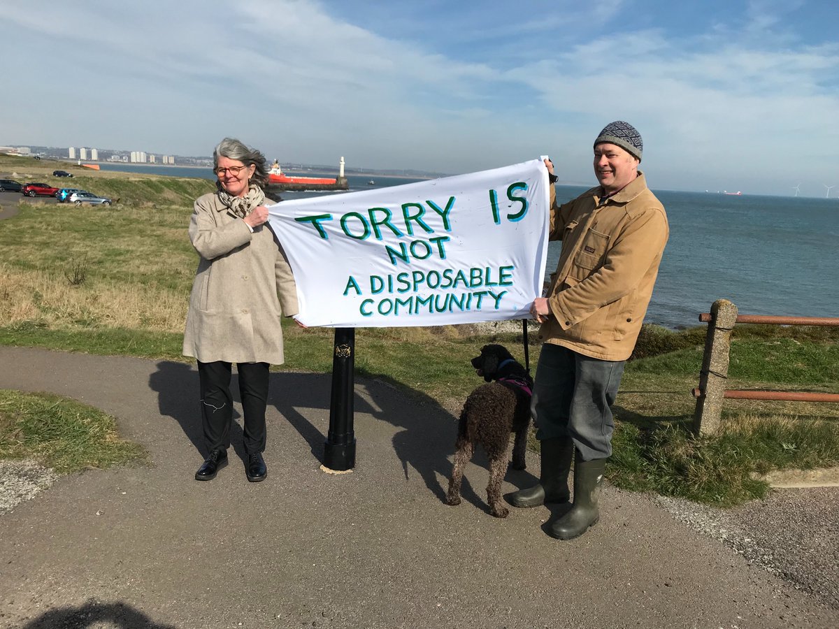 During the visit of <a href="/HumzaYousaf/">Humza Yousaf</a> and <a href="/MairiMcAllan/">Màiri McAllan</a> to <a href="/PortofAberdeen/">Port of Aberdeen</a>, we held a protest outside the gates of the harbour expansion project to call out the #landgrab by <a href="/ETZLTD1/">ETZLTD</a> in #Torry, #Aberdeen. This is NOT a #JustTransition and more money for the same people won't change it