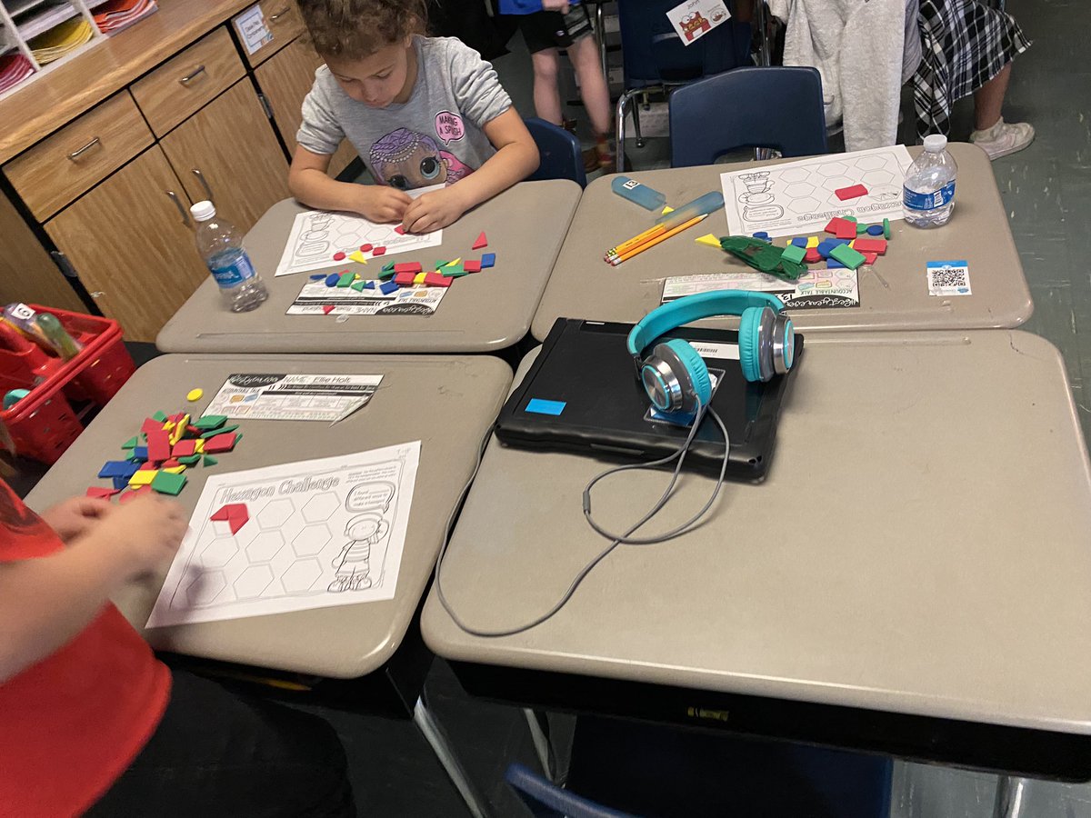Students today in math are working to put shapes together to make different shapes!
