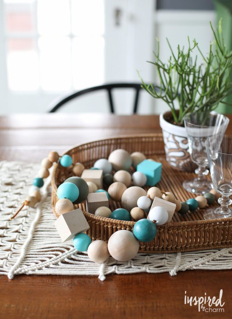 FoxRun_Wichita's tweet photo. Wooden beads + paint + string = A colorful and easy-to-make piece of apartment decor! You could hang this simple DIY garland from a hook or drape it over your headboard for a touch of style. https://t.co/xMB2ixe27f https://t.co/7K9uIhfphI