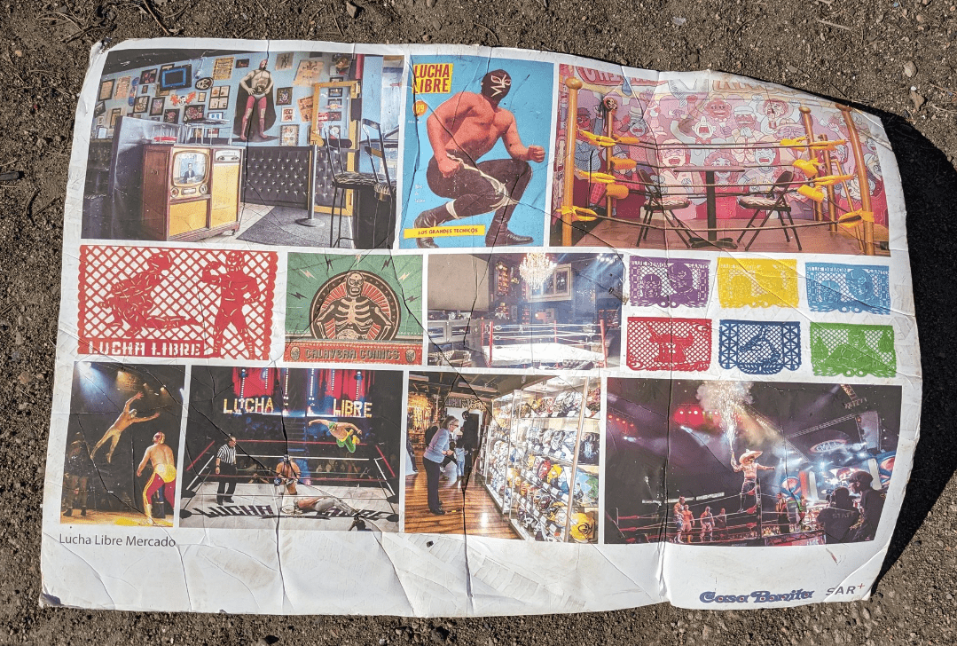 A Casa Bonita clue? "Lucha Libre Mercado."

Graphic designer Garrett Fritzler (<a href="/graphicsforward/">Graphics Forward</a>) once worked at the restaurant and says, on Friday, he saw this on the ground in the shopping plaza.

Architecture firm SAR+ says "we cannot comment on the photo one way or another..."