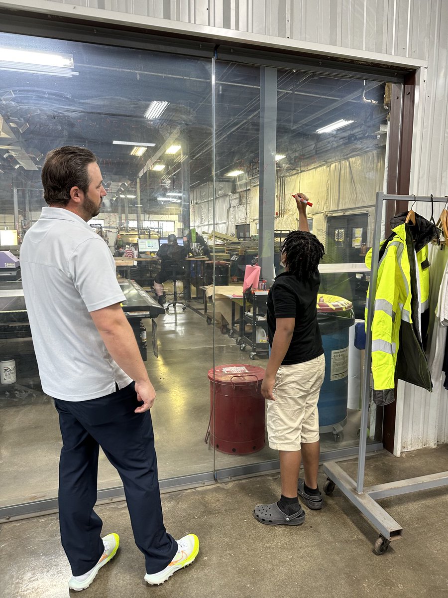 rfreers's tweet photo. West Park Elementary students learned how math is used in manufacturing, made their own sign and figured a little math on a glass wall. #DiplomaPlus #IamKCKPS https://t.co/Q04GaBVWji